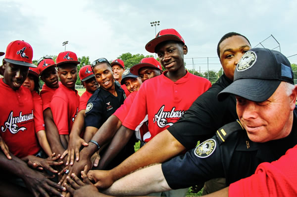 APD Officers and L.E.A.D. Ambassadors making a connection